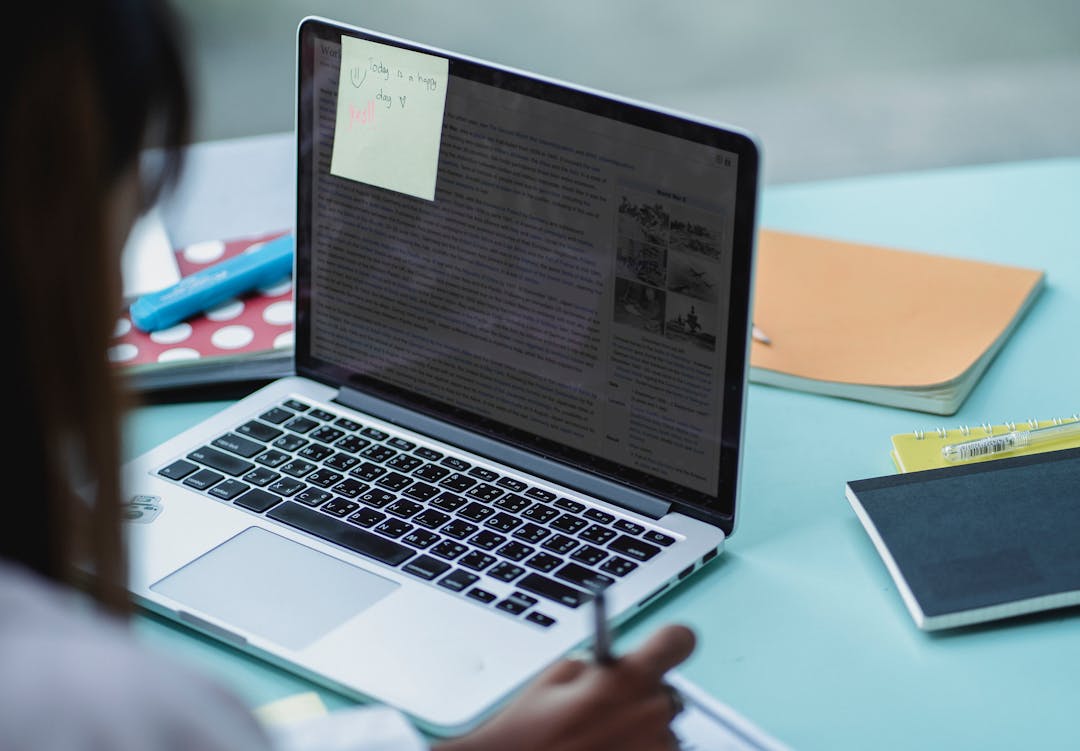 NotebookLM — student studying with laptop